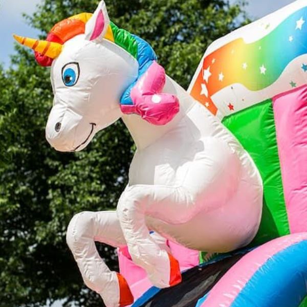 Springkussen Unicorn met glijbaan