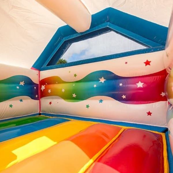 Springkussen Unicorn met glijbaan